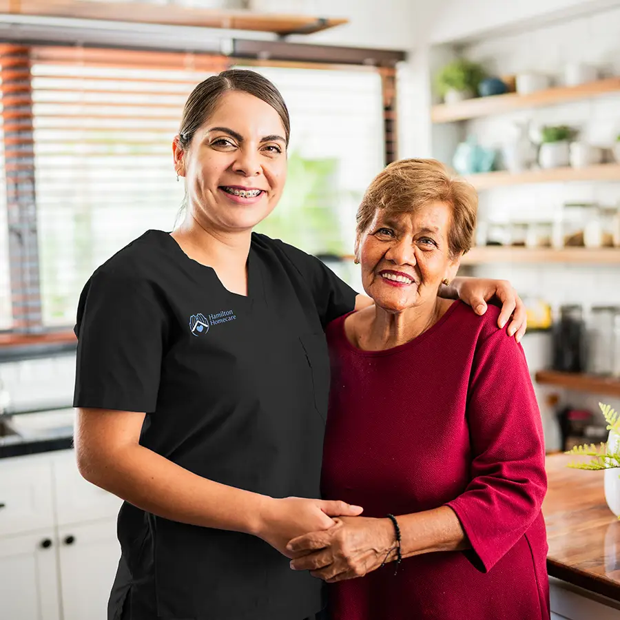 Caregiver with client in the kitchen